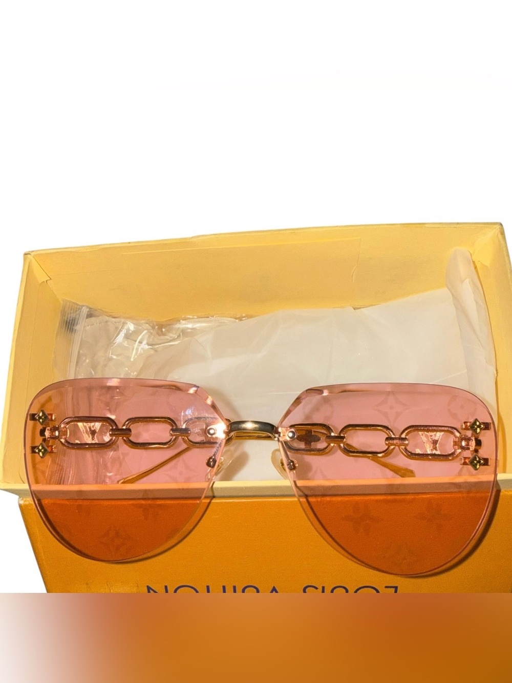Inspired Rimless Pink-to-Orange Gradient Sunglasses with Gold Chain Bridge
